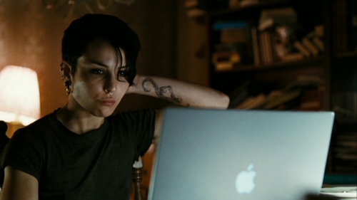 The Huntress' shadow in film: Lisbeth Salander, The Girl with the Dragon Tattoo. The survivor of a traumatic childhood, Salander is an androgynous, introverted and asocial computer hacker with a sadistic appetite for vengeance. She has difficulty emotionally connecting to people and making friends and is content to live in isolation. 